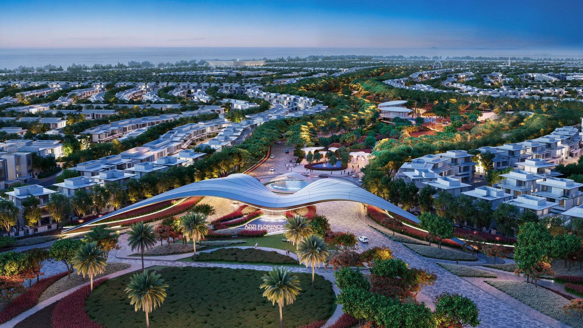 Azizi Florence by Azizi Developments — aerial view of the master community and its arrival pavilion at dusk, Um Fanain, Sharjah
